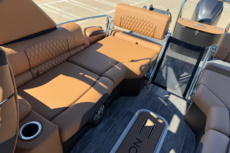 Slide: The Image of 2026 Avalon Catalina Quad Lounger Windshield with luxurious tan seating and modern design. - 50