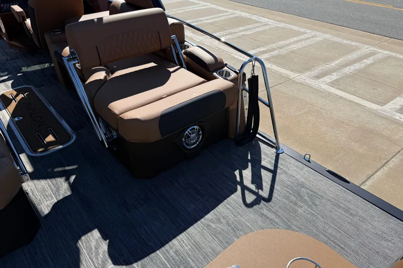 Slide: The Image of 2026 Avalon Catalina Quad Lounger Windshield interior with tan seating and sleek design. - 55