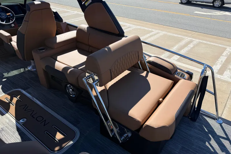 Slide: The Image of 2026 Avalon Catalina Quad Lounger Windshield with luxurious tan seating and sleek design. - 63