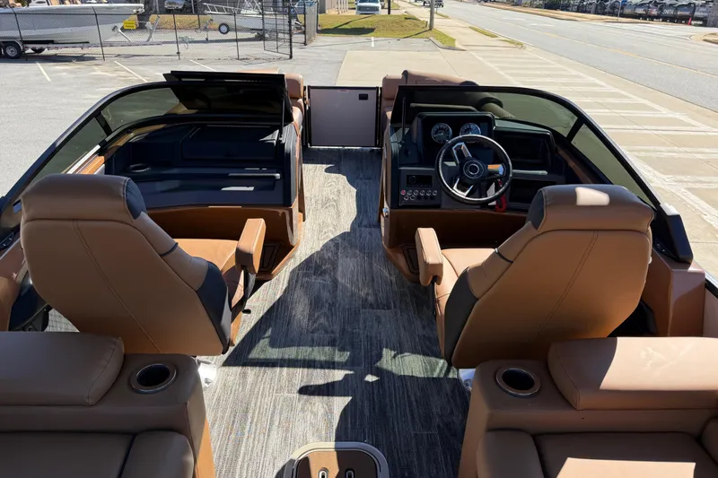 Slide: The Image of 2026 Avalon Catalina Quad Lounger Windshield interior with luxurious seating and modern dashboard. - 64