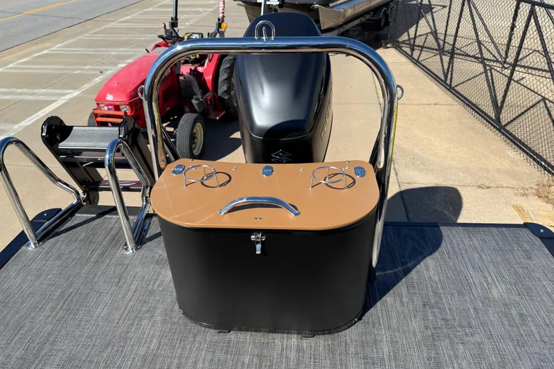 Slide: The Image of 2026 Avalon Catalina Quad Lounger Windshield boat with sleek design and modern controls. - 67