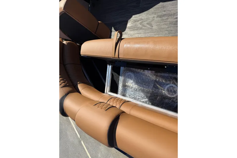 Slide: The Image of Luxurious tan seating on 2026 Avalon Catalina Quad Lounger Windshield boat. - 71