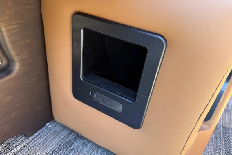 Slide: The Image of 2026 Avalon Catalina Quad Lounger Windshield interior detail with tan upholstery and black trim. - 74