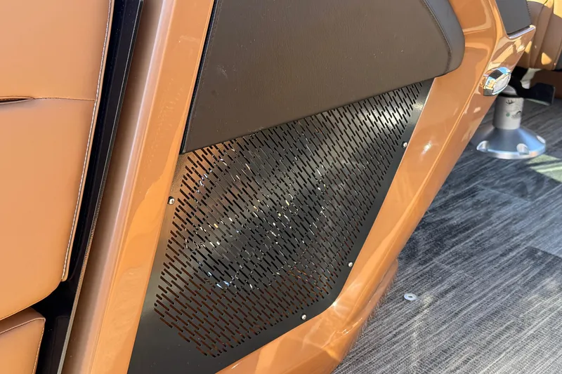 Slide: The Image of 2026 Avalon Catalina Quad Lounger Windshield interior detail with brown upholstery and black vent. - 75