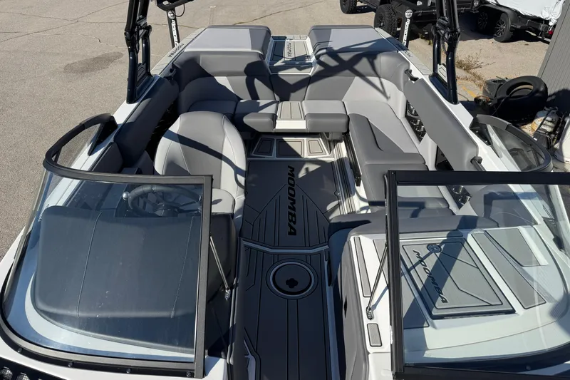 Slide: The Image of 2026 Moomba Craz boat interior with sleek gray seating and modern design. - 8