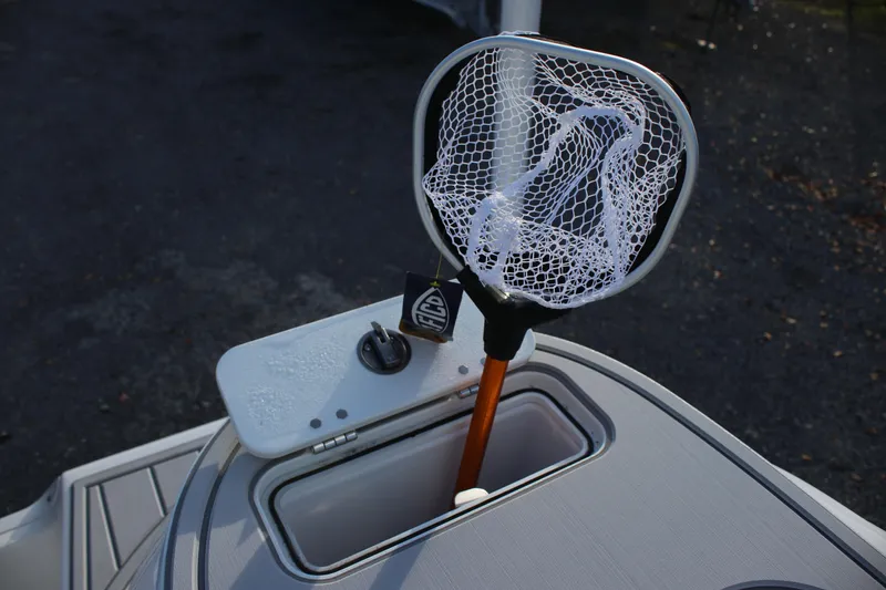 Slide: The Image of Fishing net on Sea Fox 248 Commander boat, 2026 model, with storage compartment. - 10