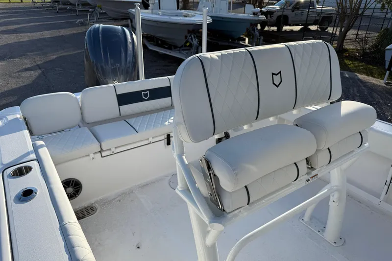 Slide: The Image of 2026 Sea Fox 248 Commander boat interior with cushioned seating and sleek design. - 15