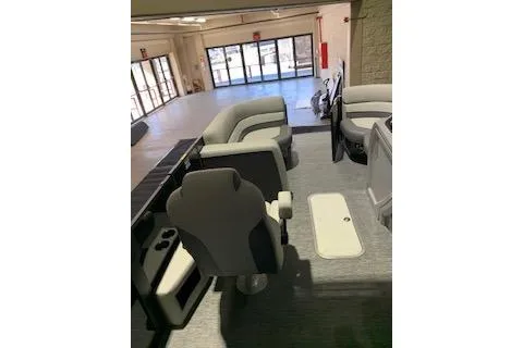 Slide: The Image of 2025 Godfrey Monaco 235 SD boat interior with modern seating and spacious layout. - 11