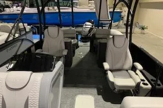 Slide: The Image of 2025 Godfrey Monaco 235 SD boat interior with luxurious seating and modern design. - 8
