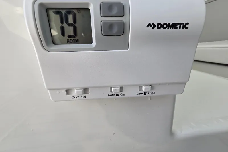 Slide: The Image of Dometic control panel on Parker 247 Explorer 2026, displaying room temperature at 79 degrees. - 22
