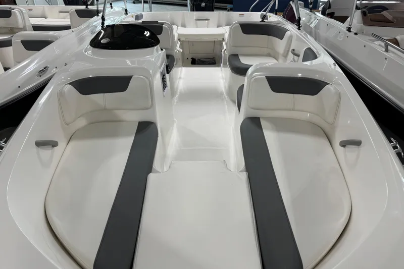 Slide: The Image of 2026 Bayliner Element E18 boat interior with spacious seating and modern design. - 12