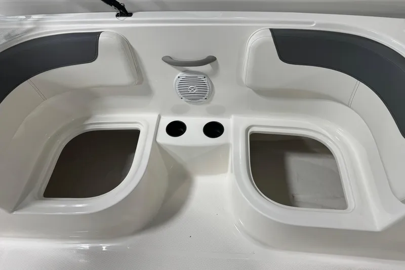 Slide: The Image of Interior seating area of 2025 Bayliner Element E18 boat with cup holders. - 7