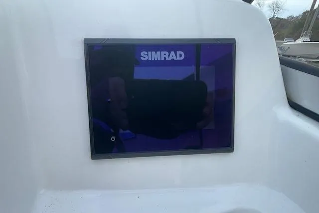 Slide: The Image of Simrad display on 2016 Seahunt 235 Escape DC boat dashboard. - 15