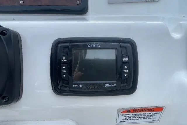 Slide: The Image of Infinity PRV-350 Bluetooth stereo on 2016 Seahunt 235 Escape DC boat dashboard. - 17