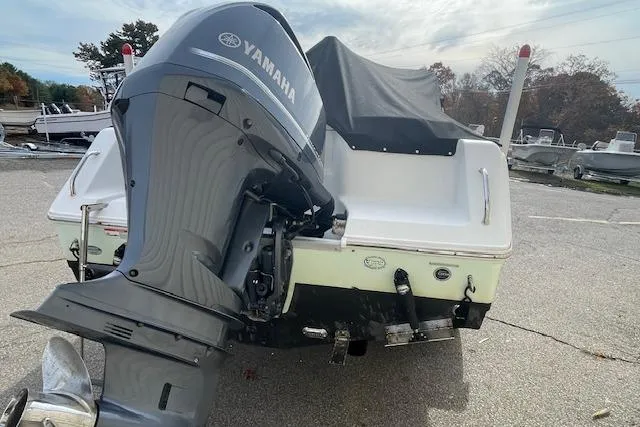 Slide: The Image of 2016 Seahunt 235 Escape DC boat with Yamaha outboard motor, parked on a lot. - 4