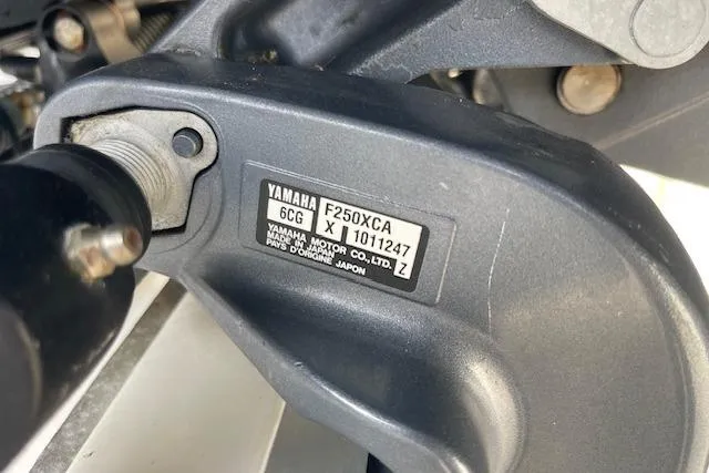 Slide: The Image of Close-up of Yamaha F250XCA engine part on 2016 Seahunt 235 Escape DC boat. - 6