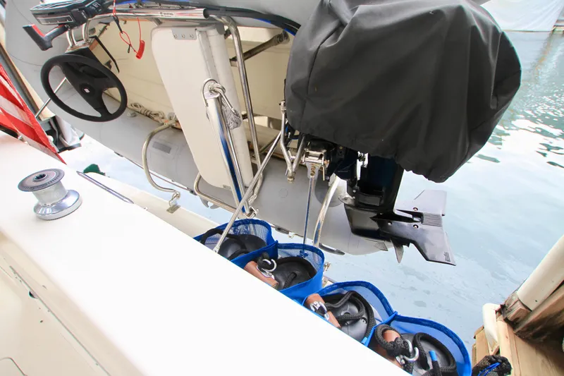 Slide: The Image of Close-up of 1998 Bayliner 3788 Command Bridge Motoryacht deck equipment and blue storage bags. - 14