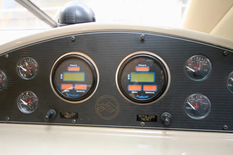 Slide: The Image of 1998 Bayliner 3788 Command Bridge Motoryacht kitchen with sink, stove, microwave, and refrigerator. - 42