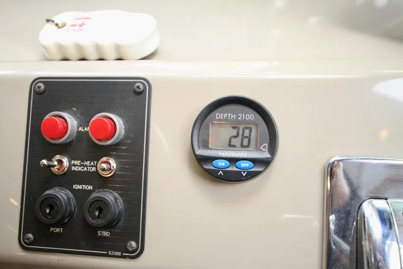 Slide: The Image of 1998 Bayliner 3788 Command Bridge Motoryacht interior with dining area and kitchenette. - 43