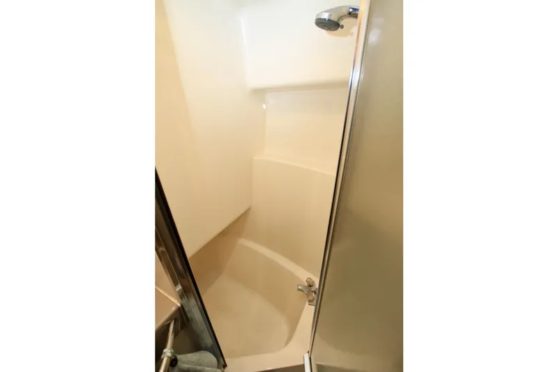 Slide: The Image of Shower area in 1998 Bayliner 3788 Command Bridge Motoryacht, featuring sleek design and fixtures. - 55