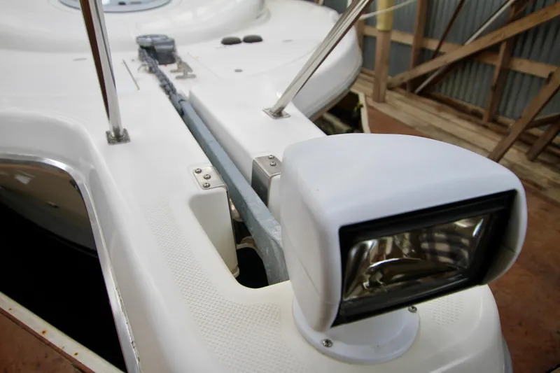 Slide: The Image of 1998 Bayliner 3788 Command Bridge Motoryacht deck with spotlight and anchor chain. - 6