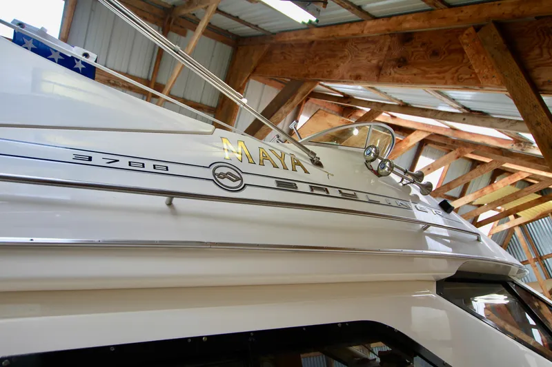 Slide: The Image of 1998 Bayliner 3788 Command Bridge Motoryacht in a wooden boathouse. - 8