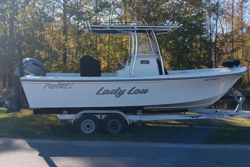 The Image of 2016 Parker 2300 Special Edition boat on trailer, side view, outdoors. - 1