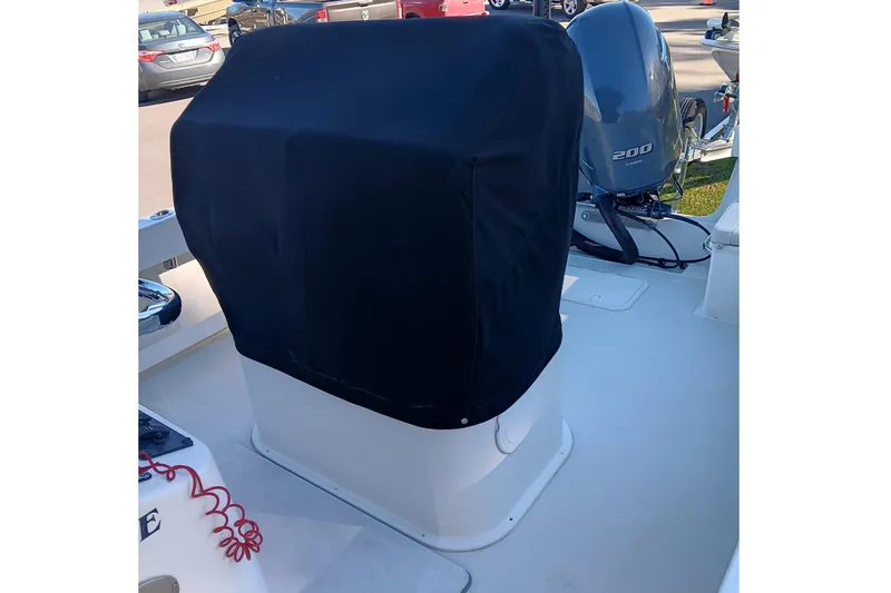 Slide: The Image of 2016 Parker 2300 Special Edition boat with covered console and Yamaha 200 engine. - 10