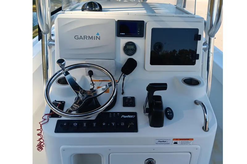 Slide: The Image of Control panel of 2016 Parker 2300 Special Edition boat with Garmin navigation system. - 11