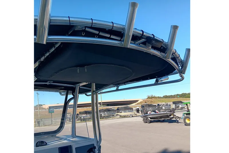 Slide: The Image of 2016 Parker 2300 Special Edition boat with T-top and rod holders. - 12