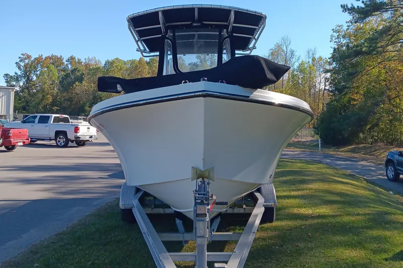 Slide: The Image of 2016 Parker 2300 Special Edition boat on trailer, parked outdoors. - 7