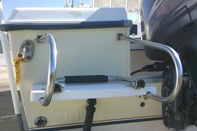 Slide: The Image of 2004 Grady-White Fisherman 209 boat with stainless steel swim ladder and motor mount. - 10