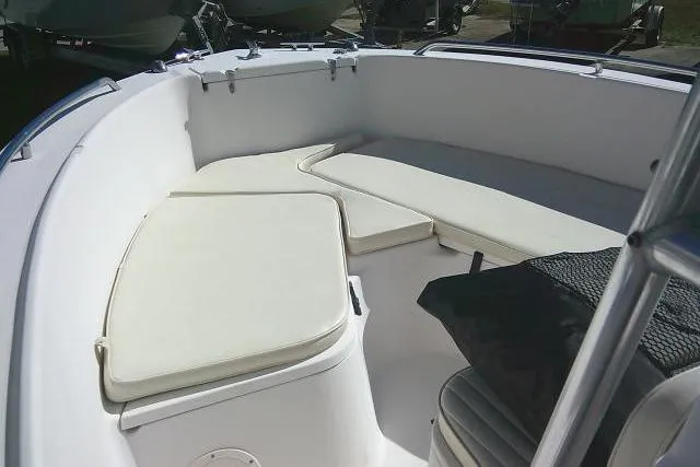 Slide: The Image of 2004 Grady-White Fisherman 209 boat interior with cushioned seating. - 23