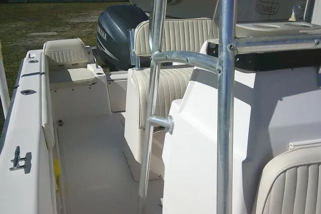 Slide: The Image of 2004 Grady-White Fisherman 209 boat interior with seating and Yamaha engine. - 27