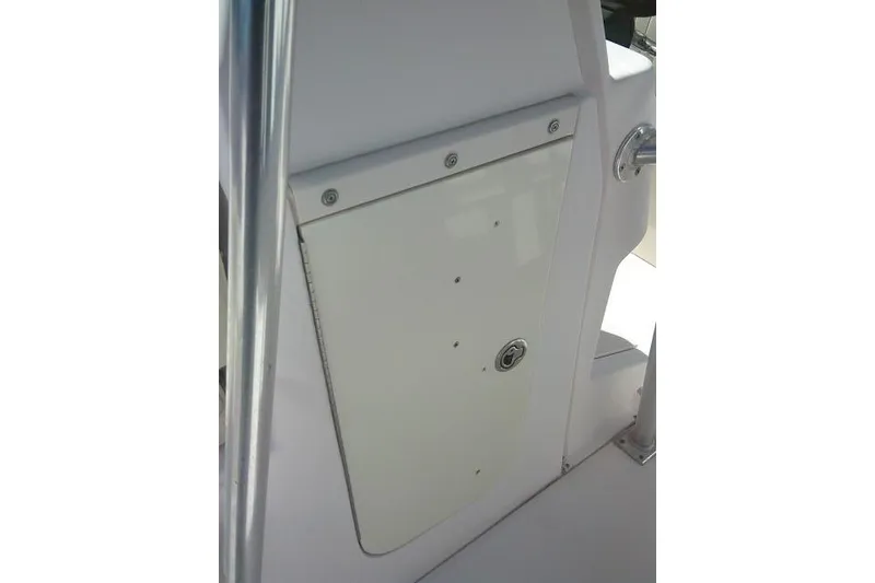 Slide: The Image of 2004 Grady-White Fisherman 209 boat interior detail with storage compartment. - 29