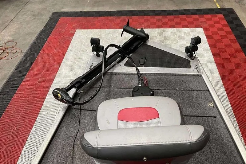 Slide: The Image of 2014 Tracker Pro 170 boat interior with trolling motor and seat. - 6