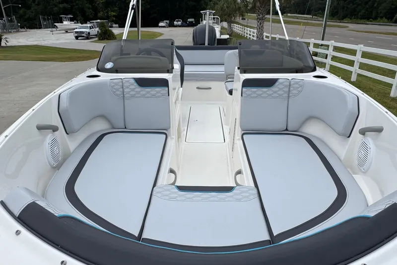 Slide: The Image of 2026 Bayliner M19 boat interior with spacious seating and modern design. - 9