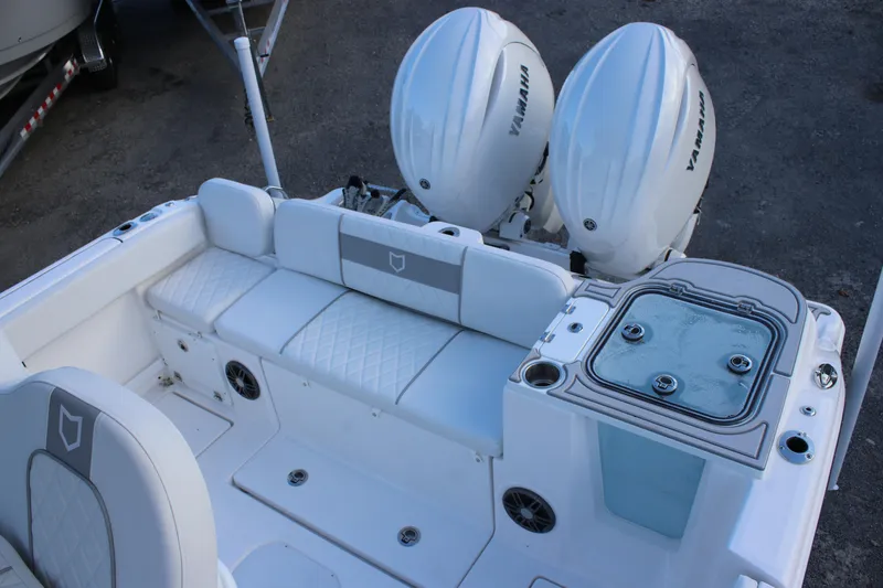 Slide: The Image of 2026 Sea Fox 268 Commander boat interior with Yamaha engines and seating area. - 17