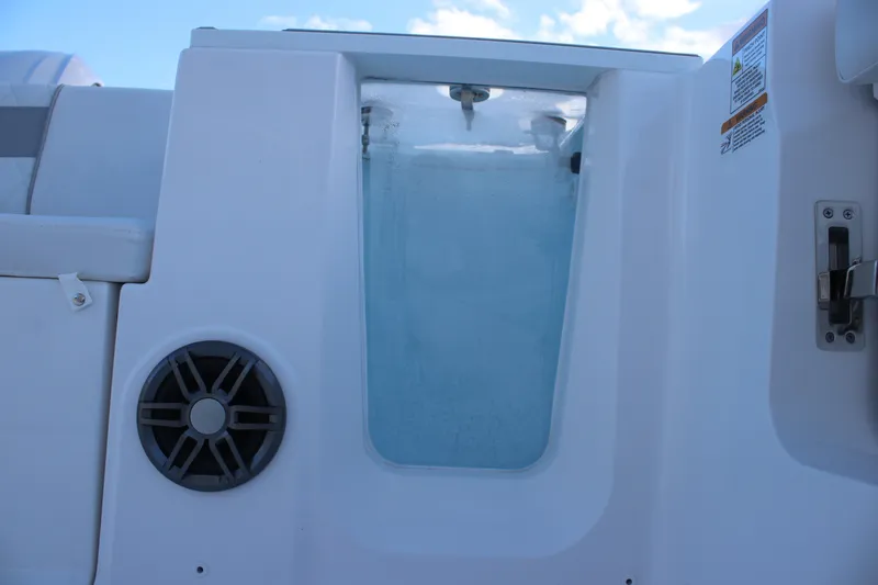 Slide: The Image of Livewell on 2026 Sea Fox 268 Commander boat, featuring speaker and latch. - 18