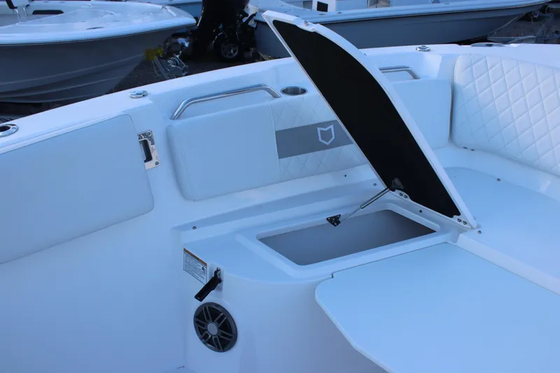 Slide: The Image of 2026 Sea Fox 268 Commander boat interior with open storage compartment. - 7