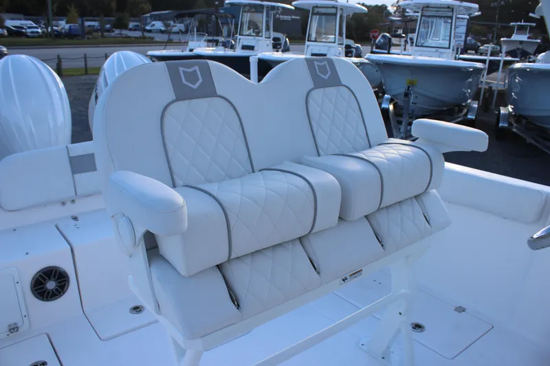 Slide: The Image of Luxury seating on 2026 Sea Fox 268 Commander boat, featuring quilted upholstery. - 8