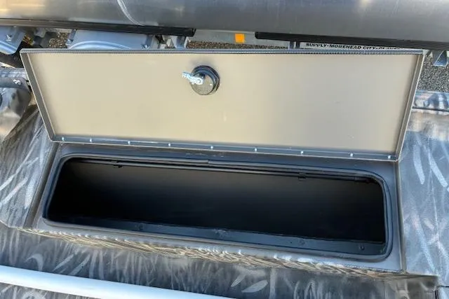 Slide: The Image of Open storage compartment on 2025 G3 1652 CC boat, showcasing interior space. - 10