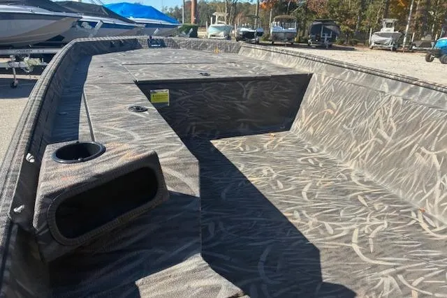 Slide: The Image of Open storage compartment in 2025 G3 1652 CC boat with cables inside. - 5