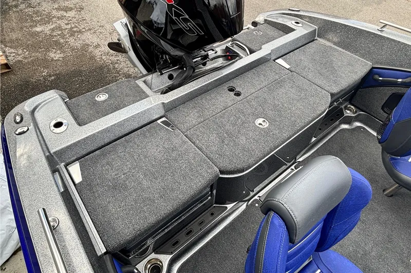 Slide: The Image of 2026 Ranger 1880MS A Pack Equipped boat interior with seating and storage compartments. - 13