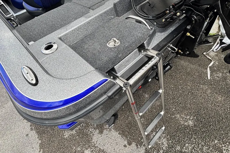 Slide: The Image of 2026 Ranger 1880MS A Pack Equipped boat with ladder and sleek design. - 14