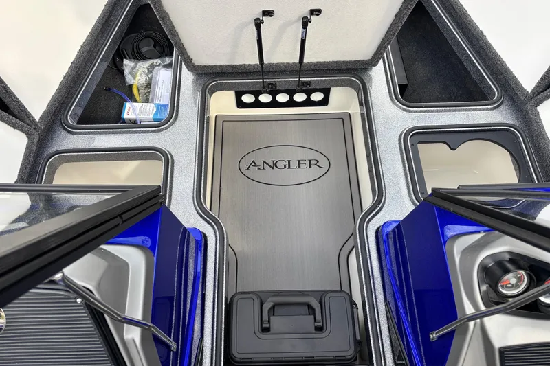 Slide: The Image of Interior view of 2026 Ranger 1880MS A Pack Equipped boat with storage compartments. - 4