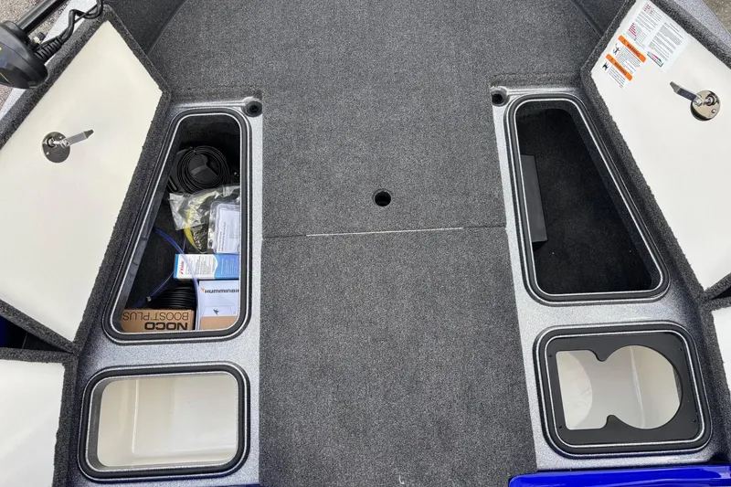 Slide: The Image of 2026 Ranger 1880MS A Pack Equipped boat storage compartments with gear and accessories. - 5