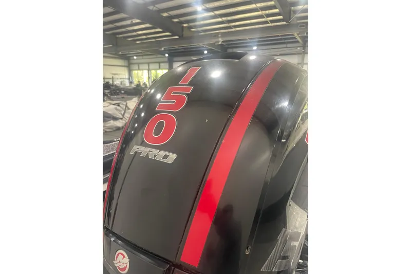 Slide: The Image of 2019 Ranger Z185 boat engine with "150 Pro" label in a warehouse setting. - 10