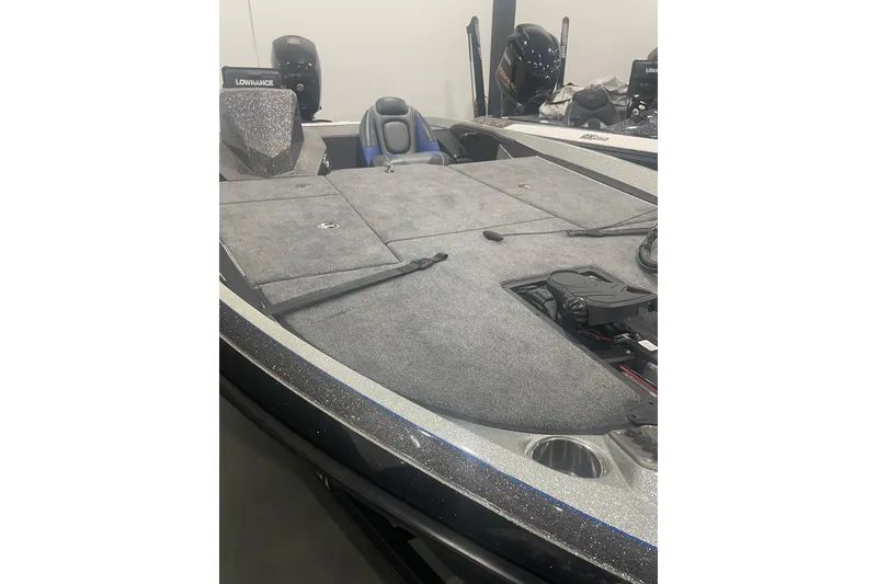 Slide: The Image of 2019 Ranger Z185 boat interior with carpeted deck and Lowrance electronics. - 6