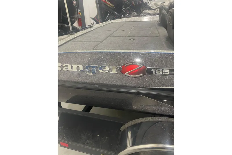 Slide: The Image of 2019 Ranger Z185 boat deck with logo and trailer. - 8